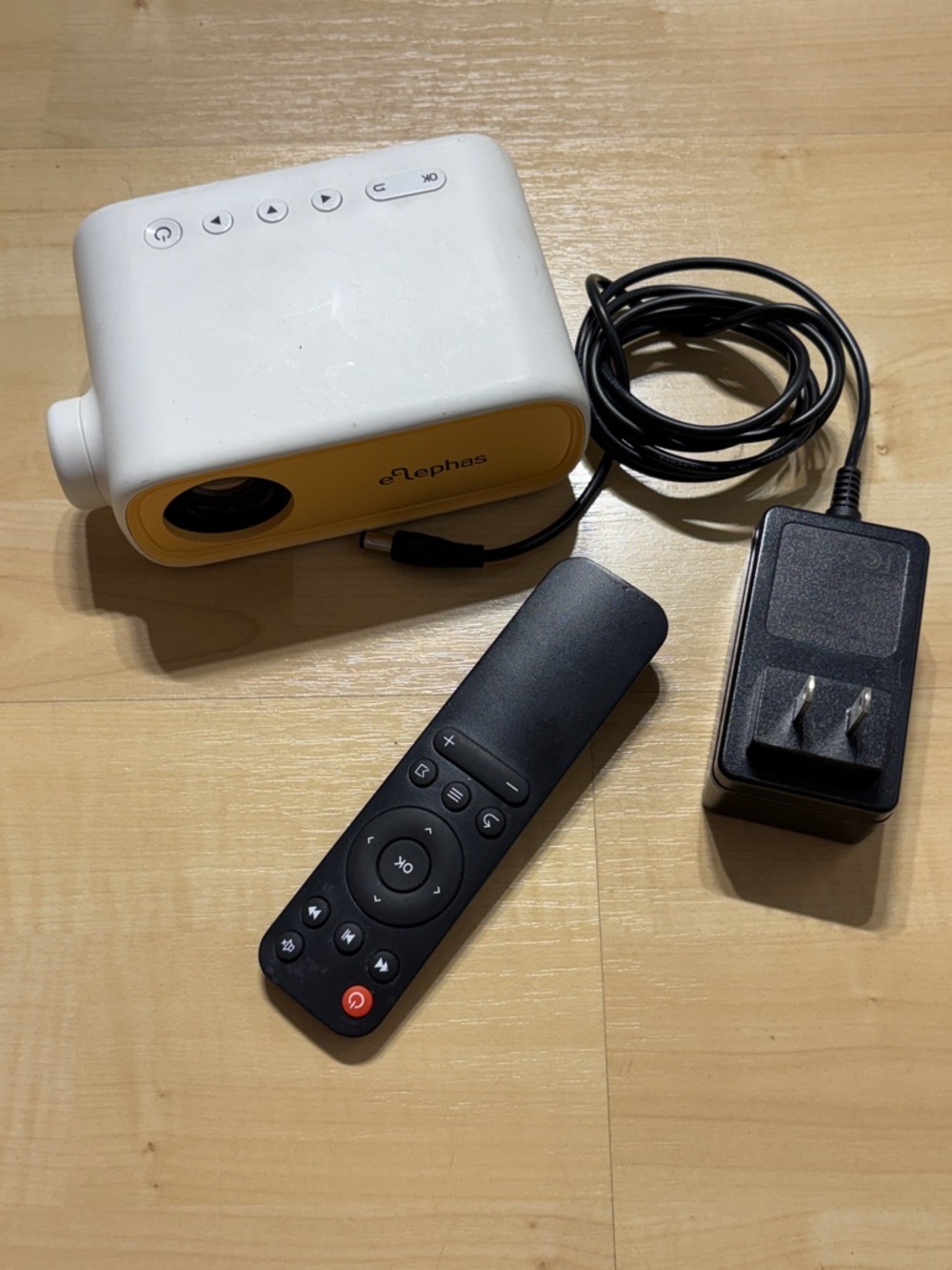 Portable Mini Projector in White and Yellow with Remote